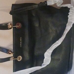 New, never used in original wrapping Michael Kors RAVEN tote